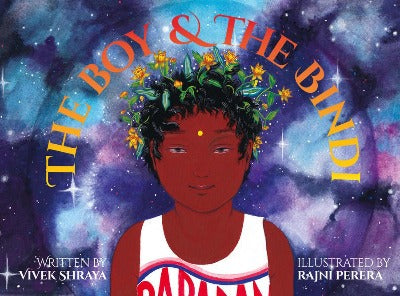 A South Asian Boy with a Bindi and Flowers