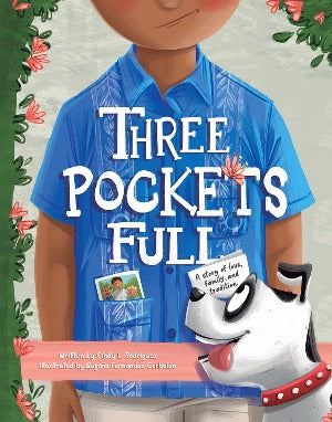 the upper body of a boy wearing a traditional wedding shirt in blue with his dog looking up at him as he looks down