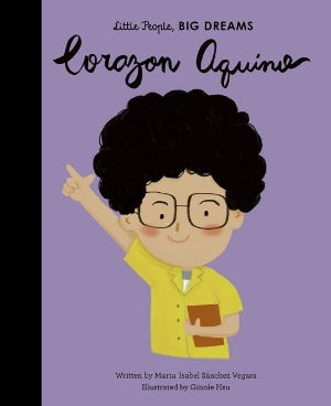 A young girl with curly hair and glasses