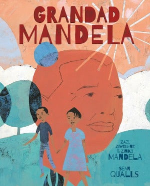 2 young children in front of the face of nelson mandela