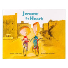 Two young boys riding a bicycle through a village, holding hands.