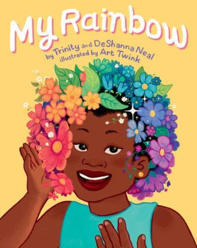 A Brown girl with a rainbow of flowers on her head