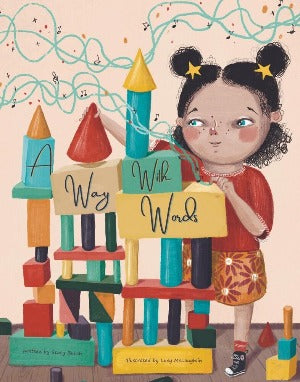 a young girl with high poms in her hair is stacking blocks of bright colors as she creates a building