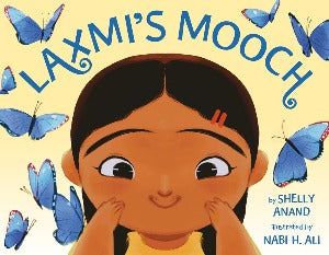 a young girl with brown skin and long straight black hair is holding her hands up to her face where we can see hairs on her upper lip