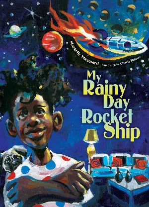 a young black boy wearing a polka dot shirt is surrounded by pictures of space and a rocket. 