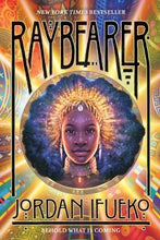 "Raybearer" is written across the front cover in large black letters. The background of the cover is a diaphanous mix of bright, jeweled colors: gold, blue, red, and green. In the center, in a circular image, a young Black woman with face paint, jewelry, and a glowing gold headdress looks out at the audience. At the very bottom of the book, in smaller letters, it reads "Behold what is coming."