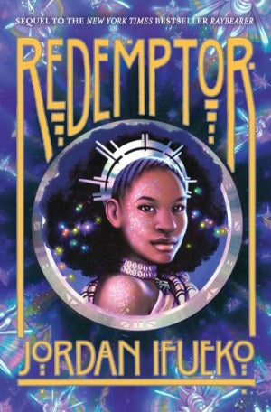 Beneath the large title, "Redemptor," written in gold letters, a young Black woman wearing a silver headpiece looks out at the audience.