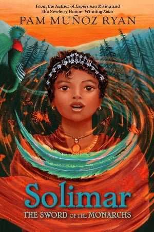 a girl with brown wavy hair, and wrapped in an orange cloak is standing facing forward surrounded by a swirl of green feathers and a forest