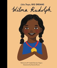 A young African American Girl wearing a blue top and gold medal